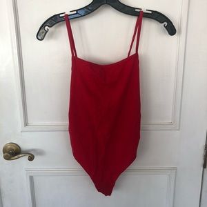 red bodysuit